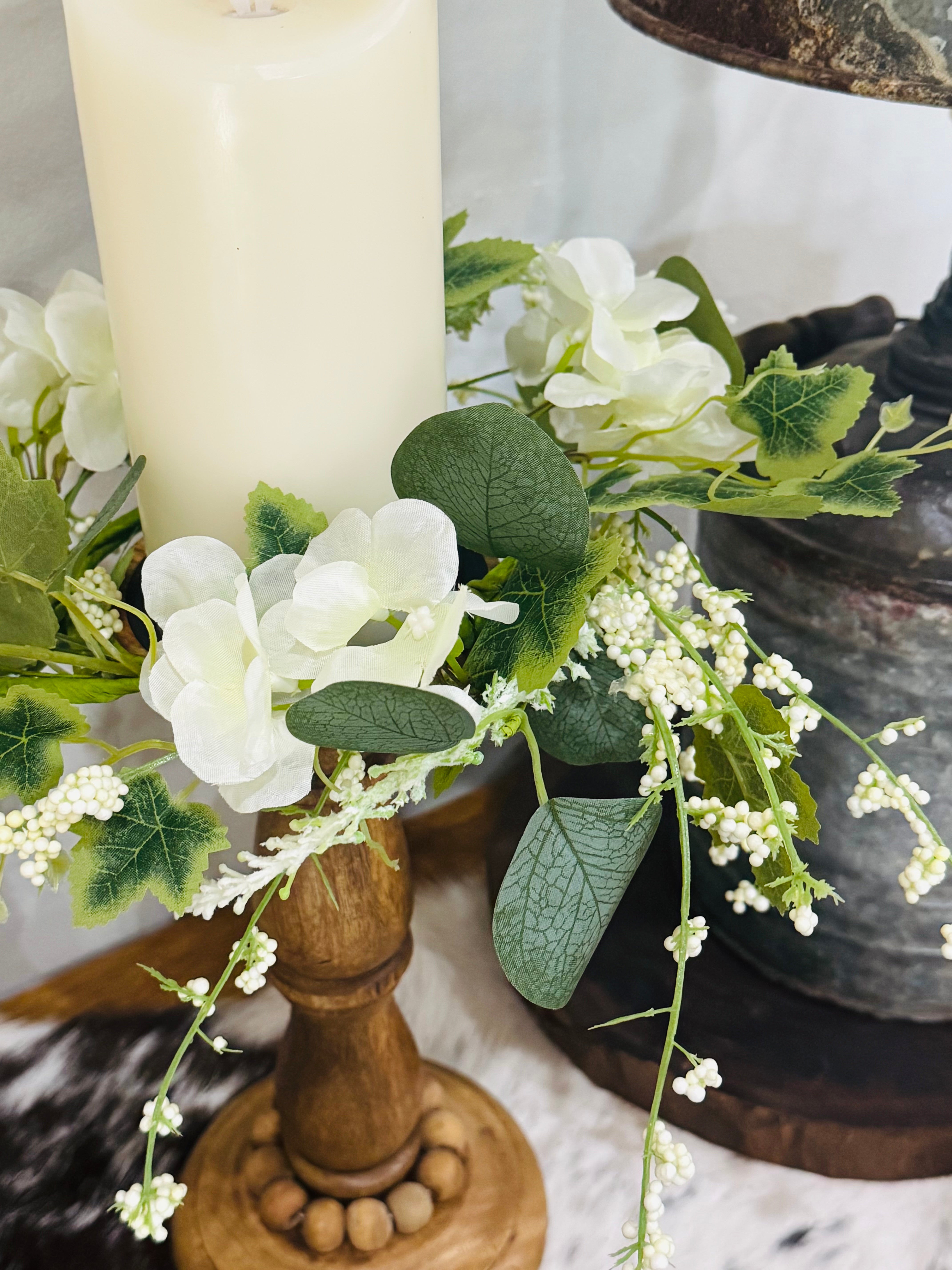 Cream hydrangea floral candle ring centerpiece for pillar candles and wedding table decor