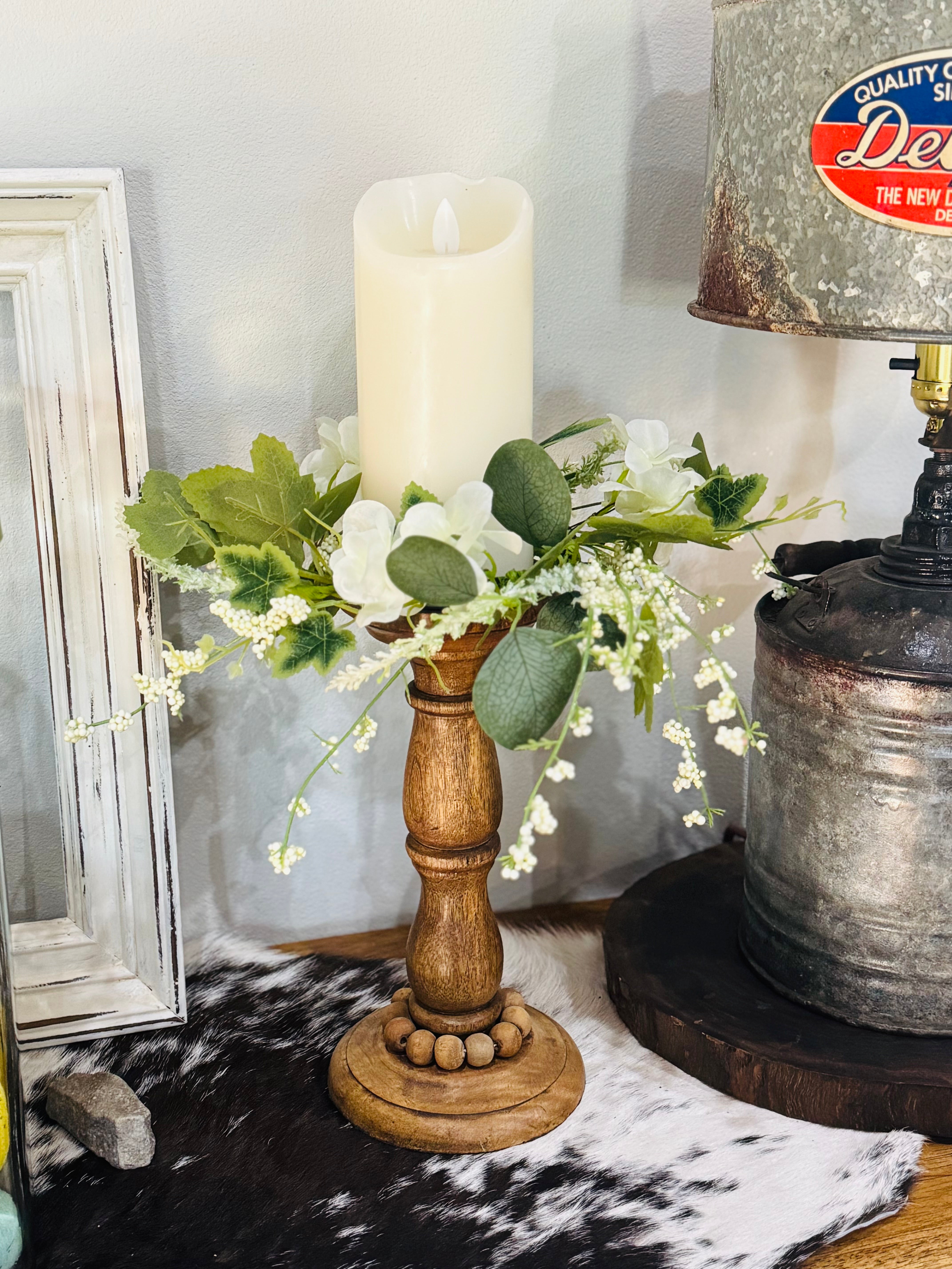Cream hydrangea floral candle ring centerpiece for pillar candles and wedding table decor