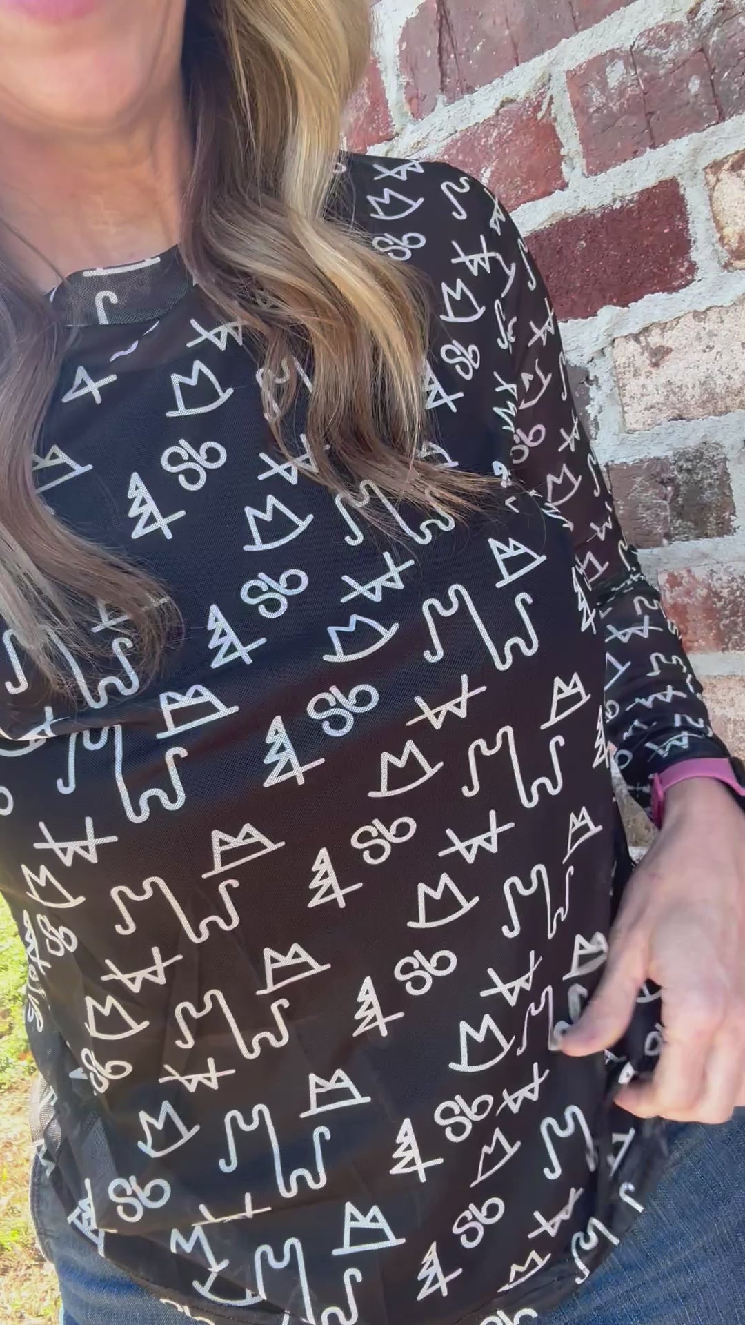 Load video: Black Brand Sheer Mock Neck Top